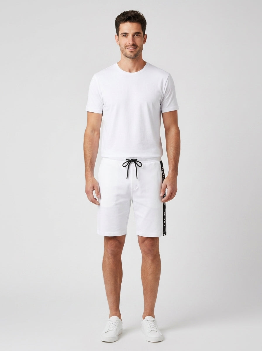 Bermuda SPORTY LOGO SHORTS - foto indossata