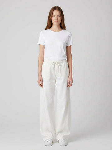 Pantaloni Guess W6GA2JD5NW2 GJ LR JOGGER TWISTED EXSTRAWIDE - foto indossata